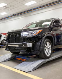 Toyota on vehicle lift | Pedersen Toyota in Fort Collins CO
