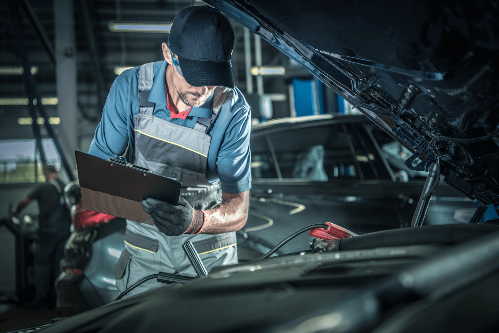 Service Center Technician Working on a Used Vehicle